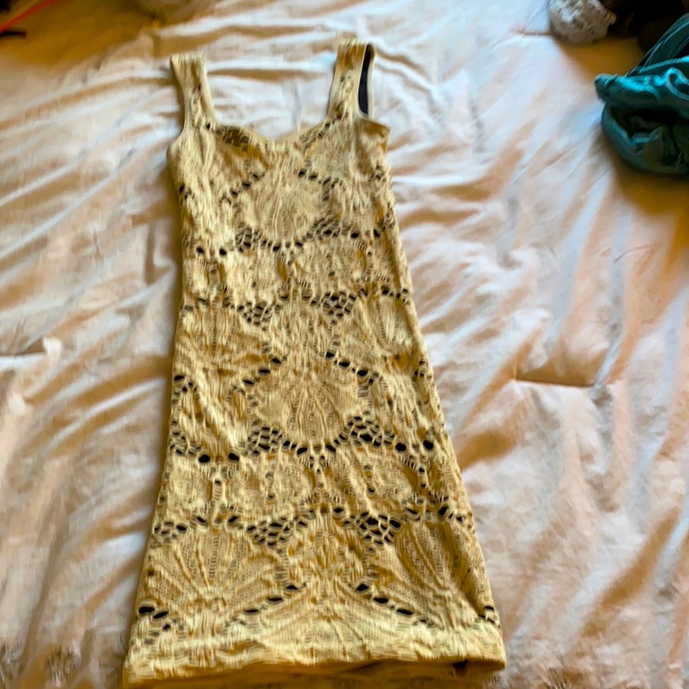 Off white tank dress by Intimately Free People in case.
